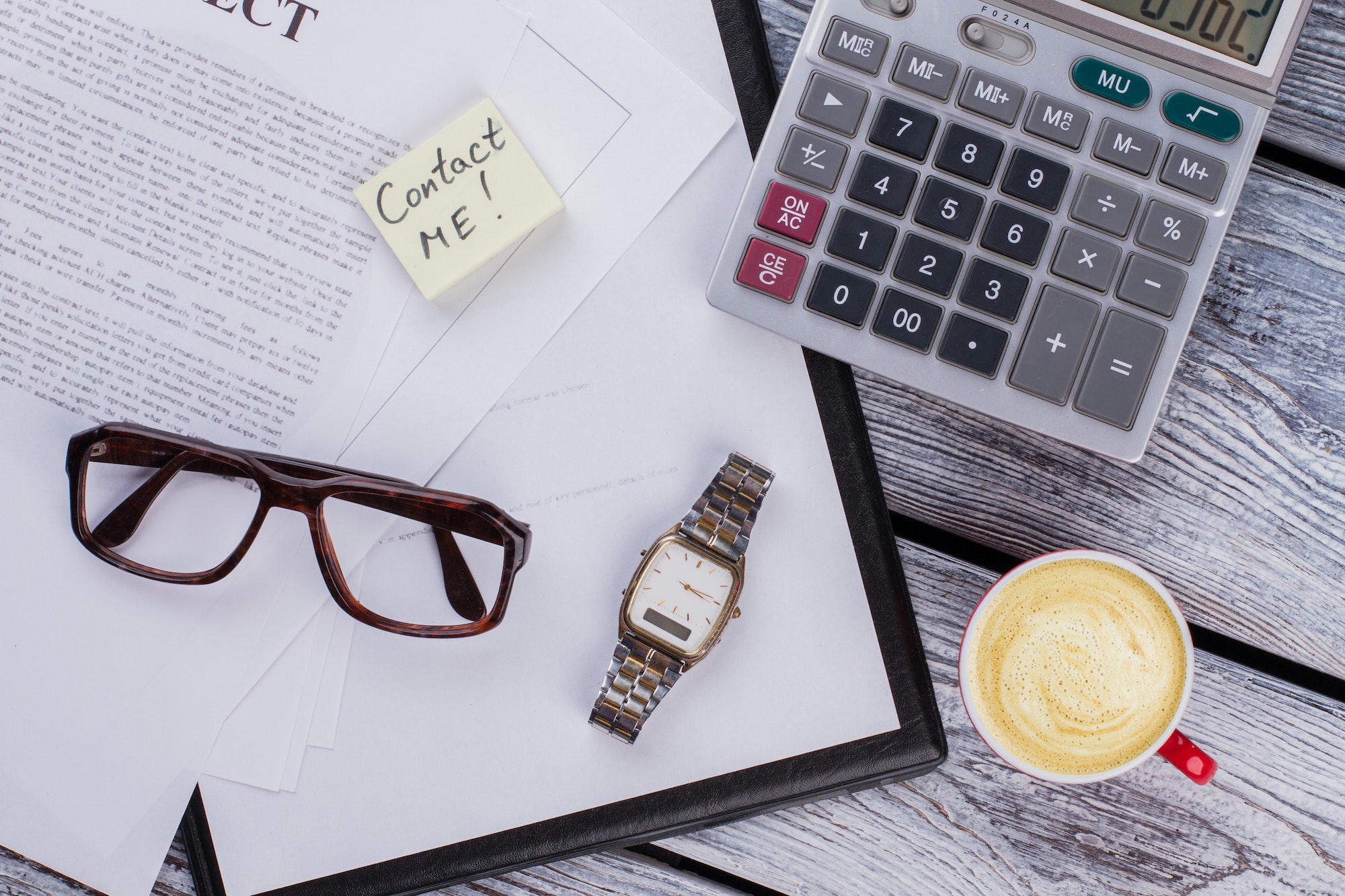 Business accounting and business card with contact me note. Business accounting and business card with contact me note.